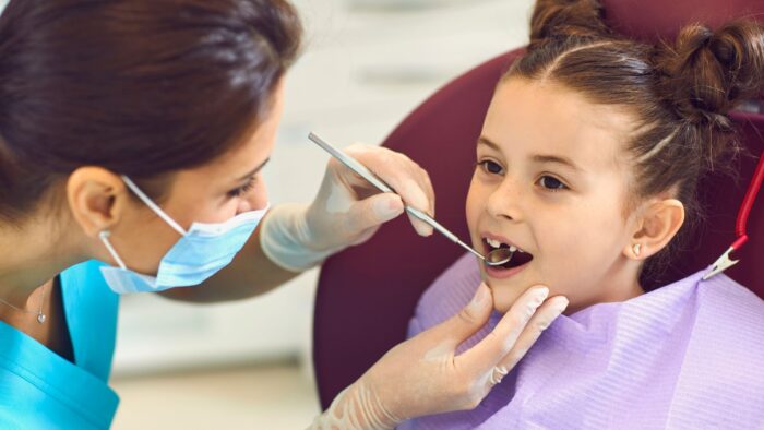 Dental Hygiene for Kids_ 5 Reasons It's So Important - Child At Dentist